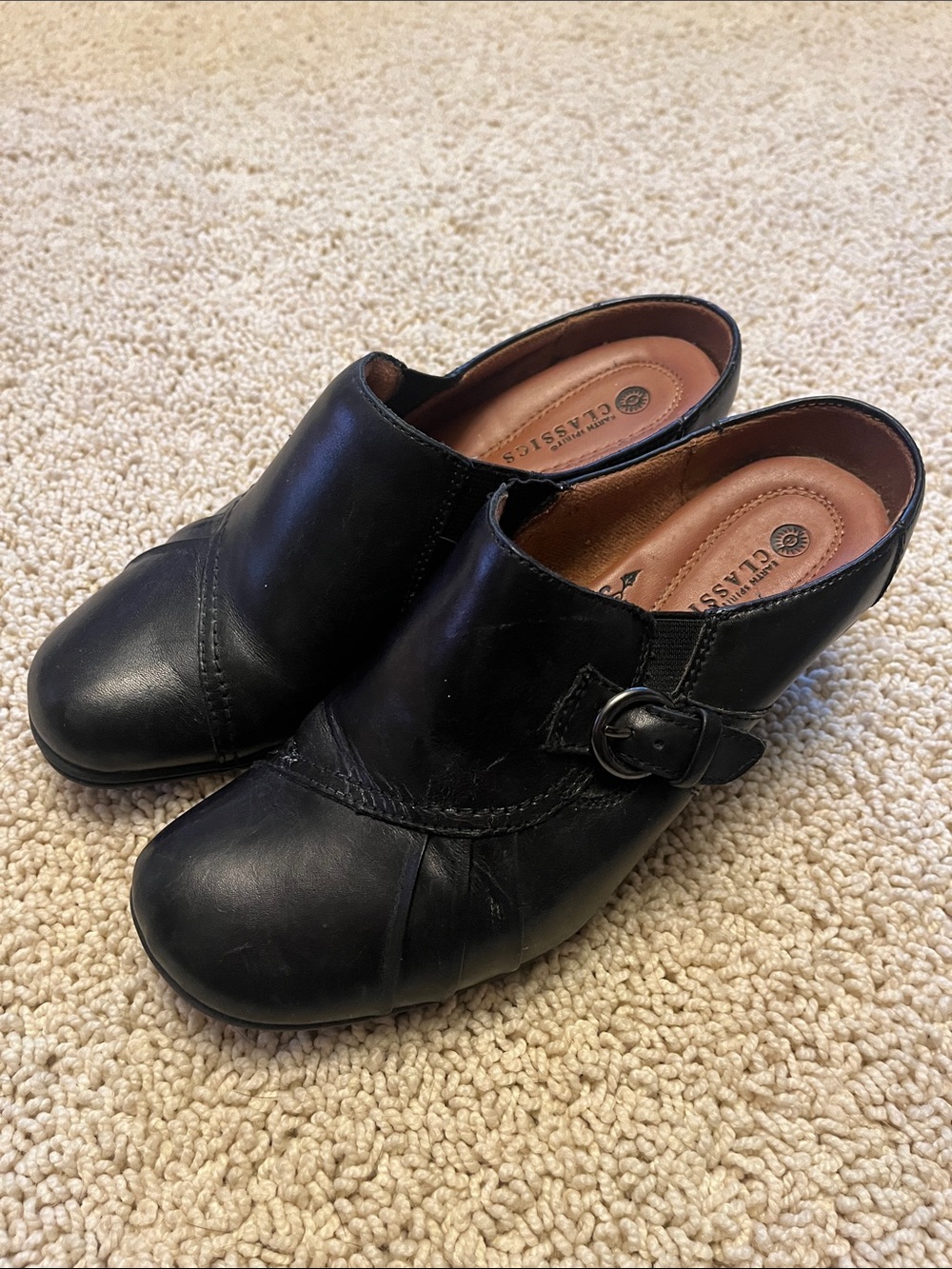 Clarks Earth Spirit Black Leather Slip-On Mule with Buckle Accent